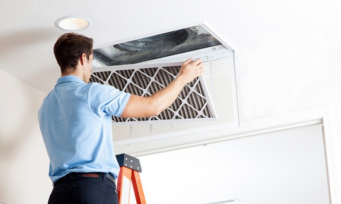 Appliance technician at work