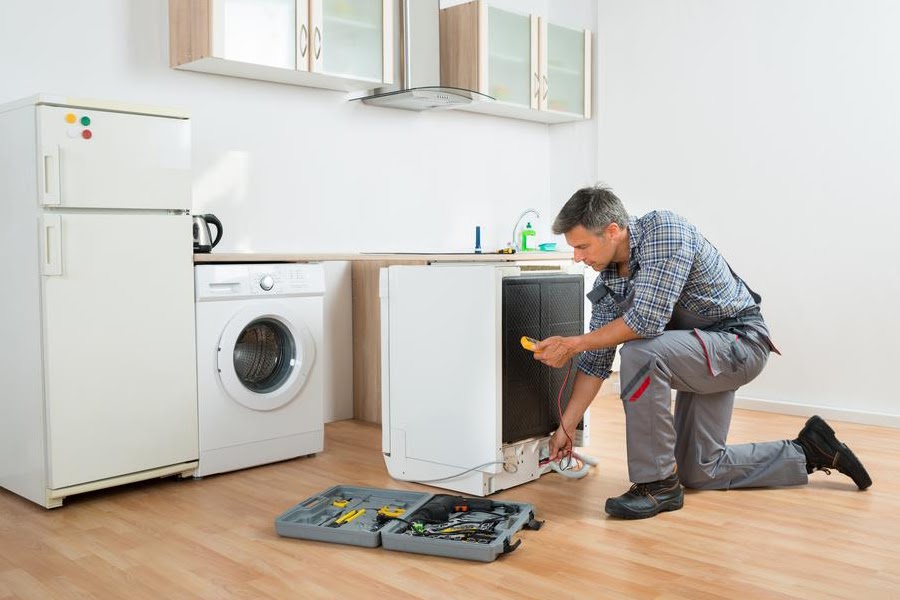 Appliance technician at work