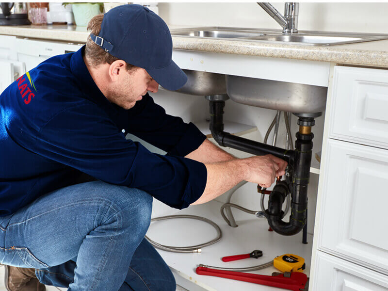 Appliance technician at work