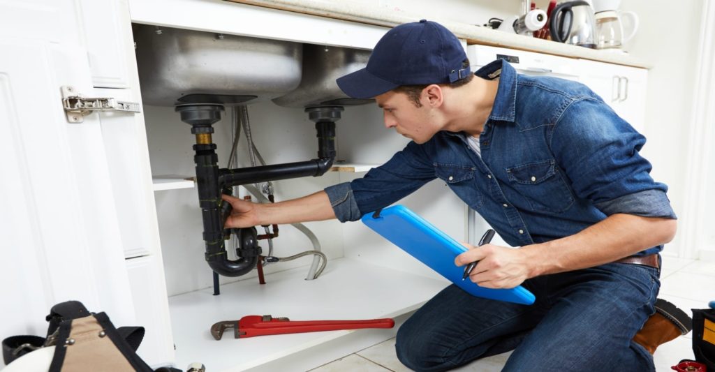 Appliance technician at work